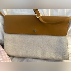 Paravel crossbody leather and nylon bag
Adustable strap
Magnetic snaps